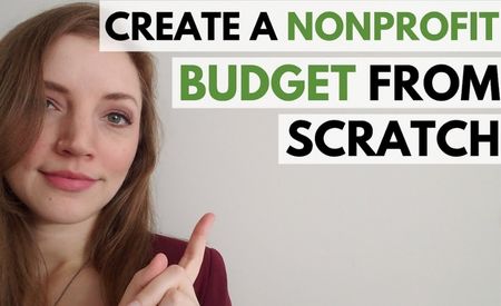 Picture of a woman pointing to title: Create a Non-profit Budget From Scratch